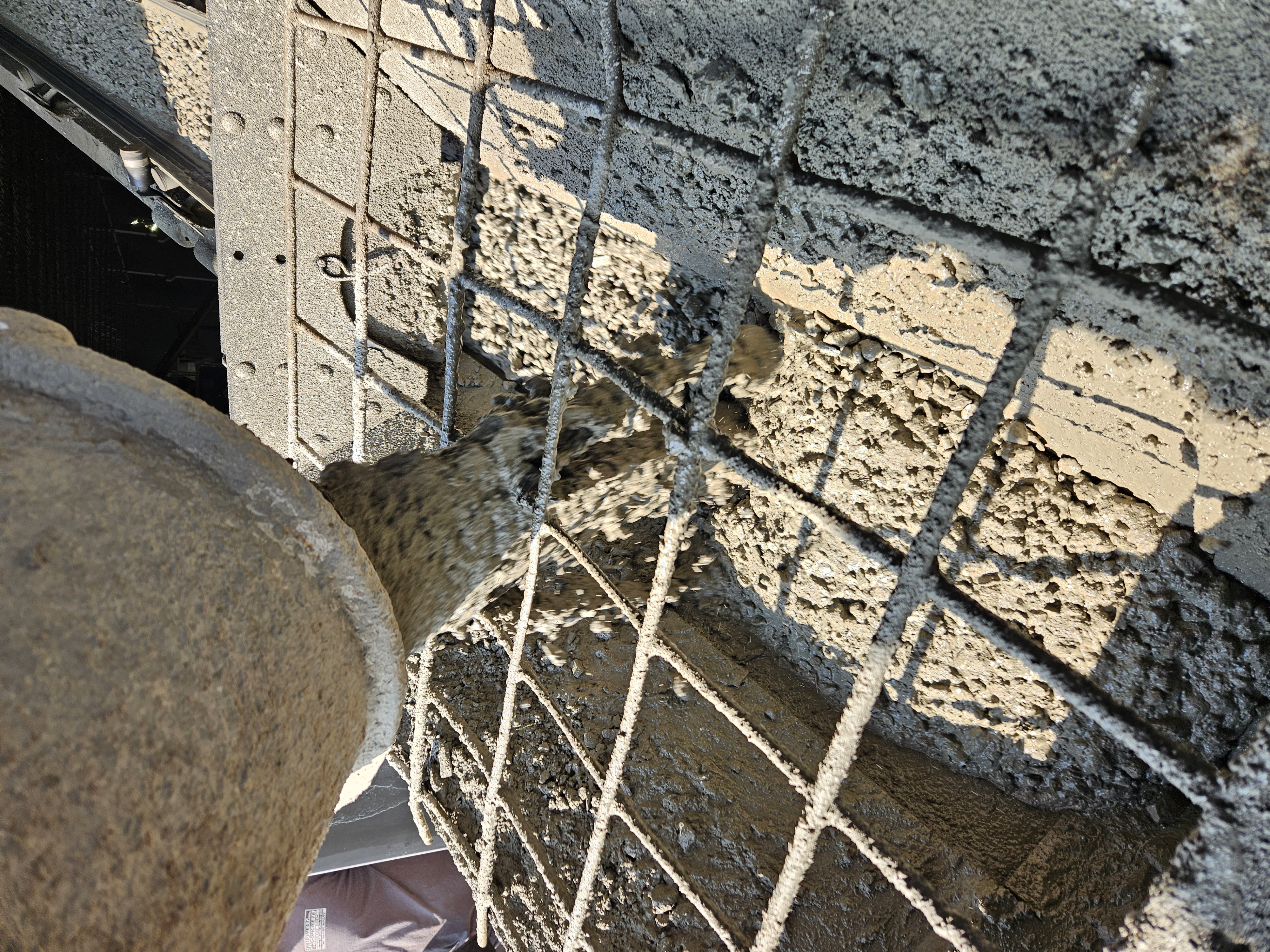 Crew finishing concrete